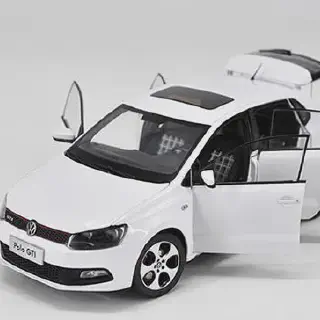 /img/52050-mini-volkswagen-polo-diecast-display.webp